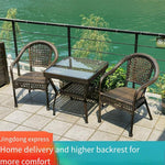 Outdoor Courtyard Table And Chair Combination Balcony Rattan Three Piece Set Modern Simple Home Stay Rattan Chair Resort Courtyard Teahouse PE Imitation Leisure Combination 2 High Back Chairs + 64 Storage Table